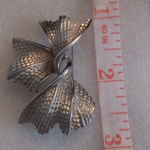 Elegant Silver Bow Brooch
